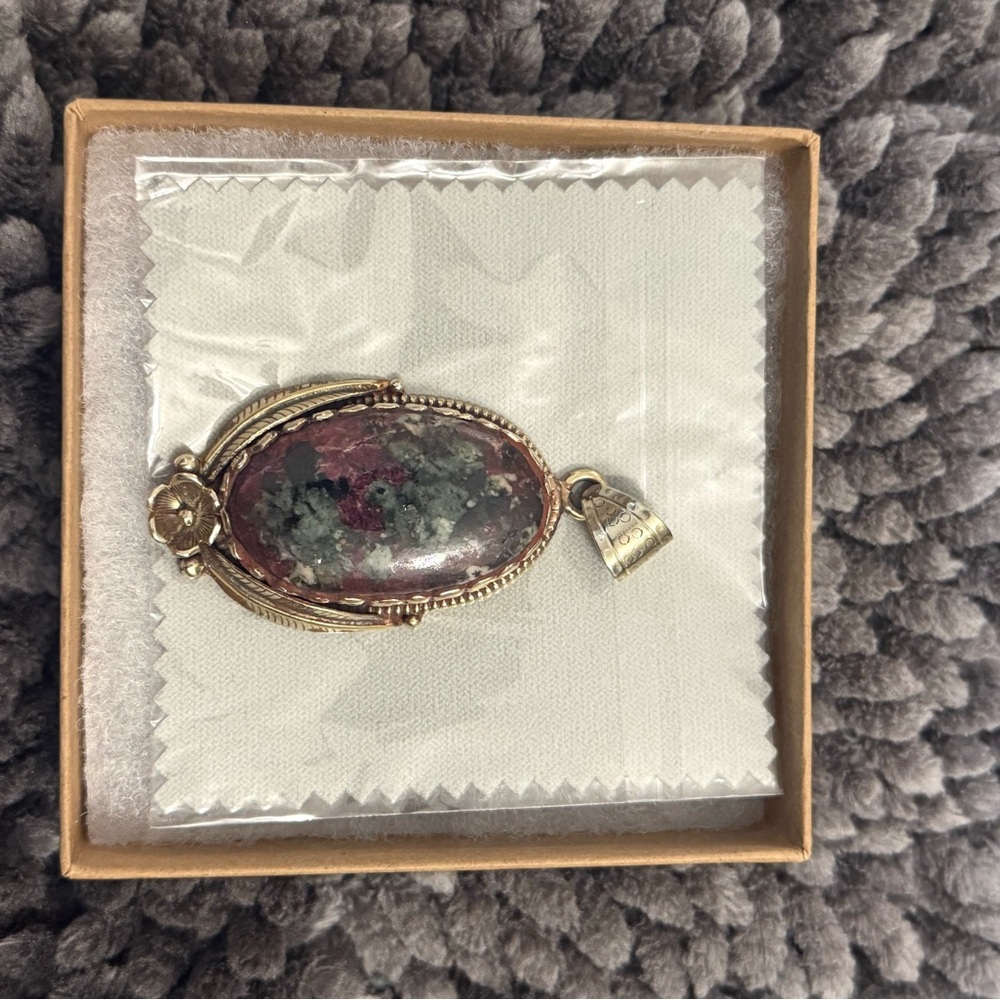 Elegant Gold and Red Pendant